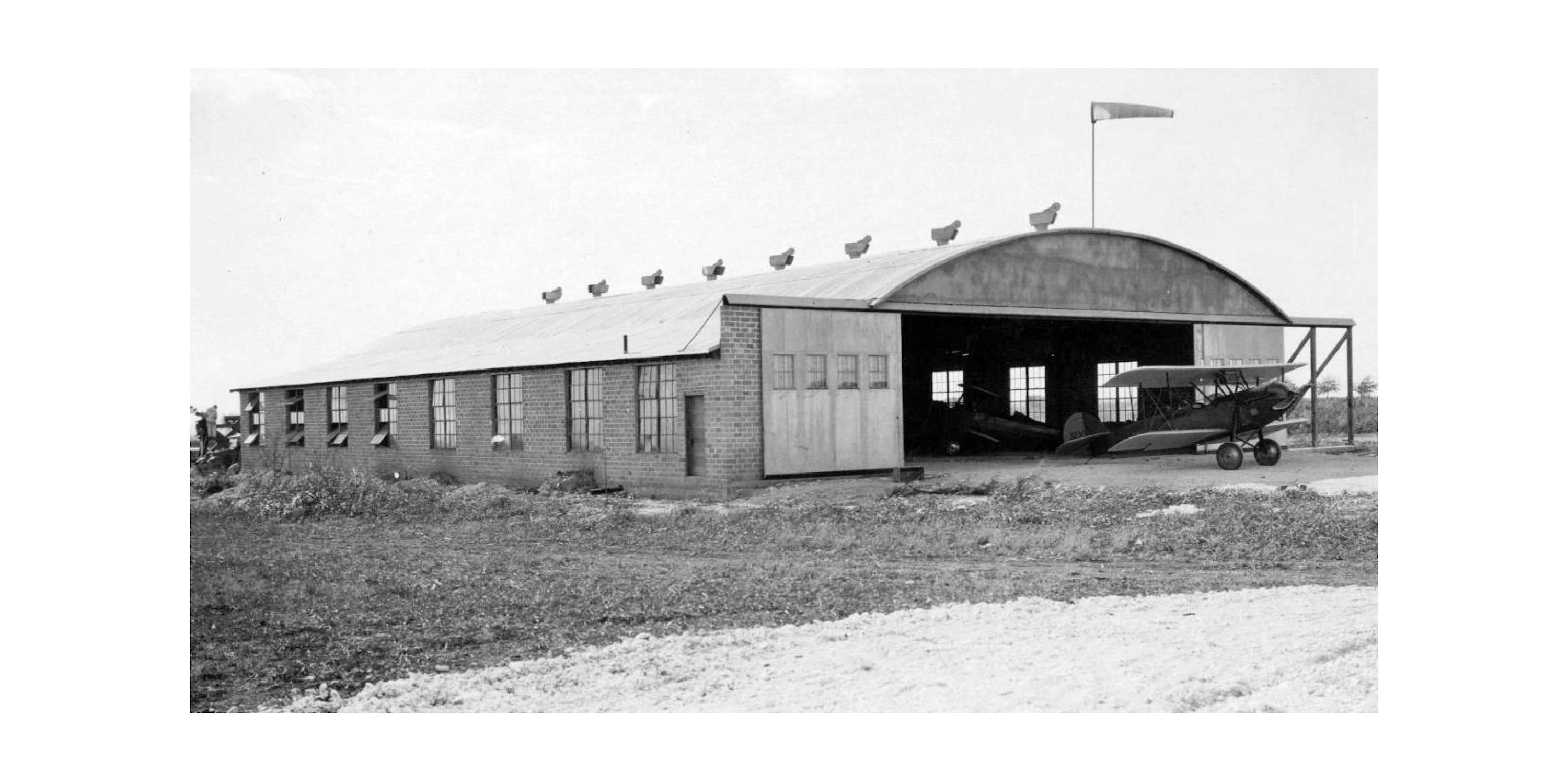 Hangar Exterior Vintage 3000x1500px.jpg