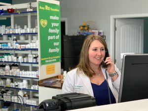 Pharmacist answering phone
