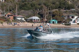 Newport Coastal Adventure passing by Crystal Cove Historic District Newport Coastal Adventure