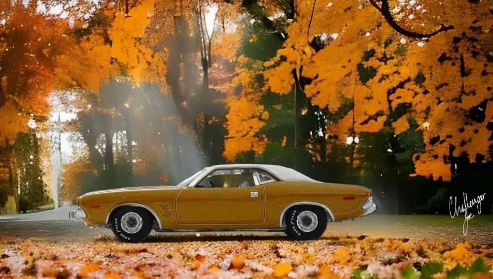 Auto World 1974 Dodge Challenger Rallye in Gold