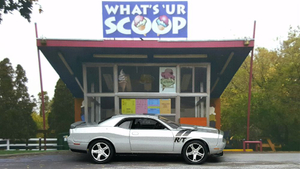 1:64 scale die cast of a 2011 Dodge Challenger parked outside of the What's UR Scoop ice cream shop. What's UR Scoop