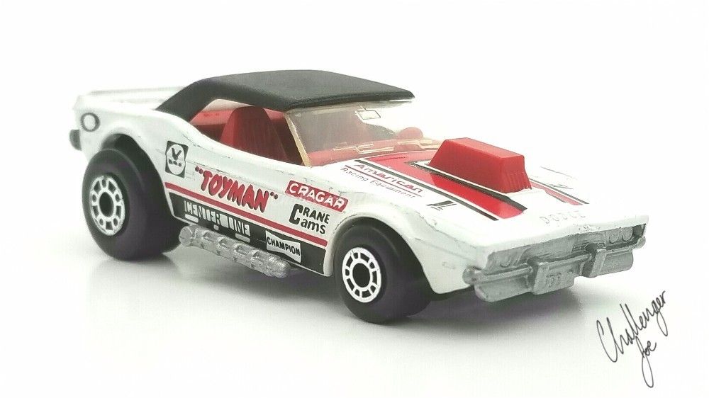 Passenger side aerial view of the Matchbox White Toyman Challenger MB White Toyman PSA