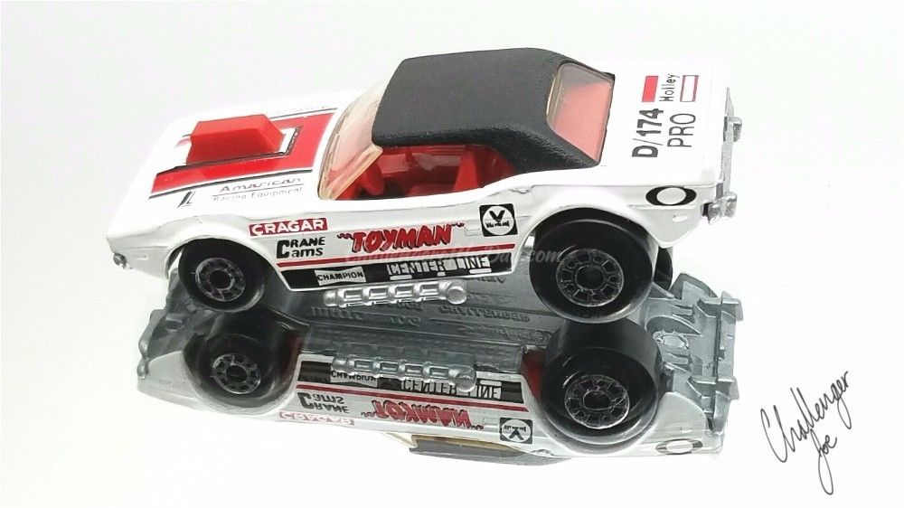 Mirror view of the Matchbox White Toyman Challenger MB White Toyman Mirror View