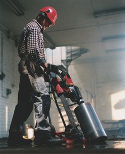 Core Drilling at a specific angle to reach a specific location on the other side of the slab. Concrete Core Drilling - Ohio Concrete Sawing & Drilling Contractor