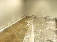 Excavation of dirt below the slabs