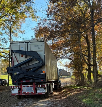 rear view of sideloader with loaded container
