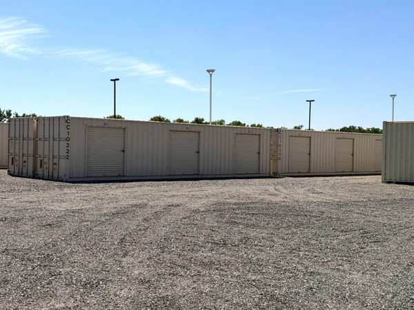 Sideloader equipment relocating a forty-foot Conex container at the Richland project