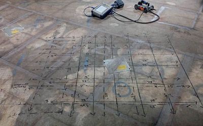 This image shows top rebar (dashed lines), bottom rebar (solid lines), and conduit (red). Concrete-Scan-at-Hospital-for-Conduit-and-Rebar-Akron-OH.jpg