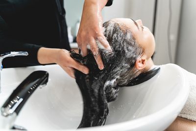 focused-photo-on-female-hands-that-washing-hair-2023-11-27-05-29-29-utc.jpg