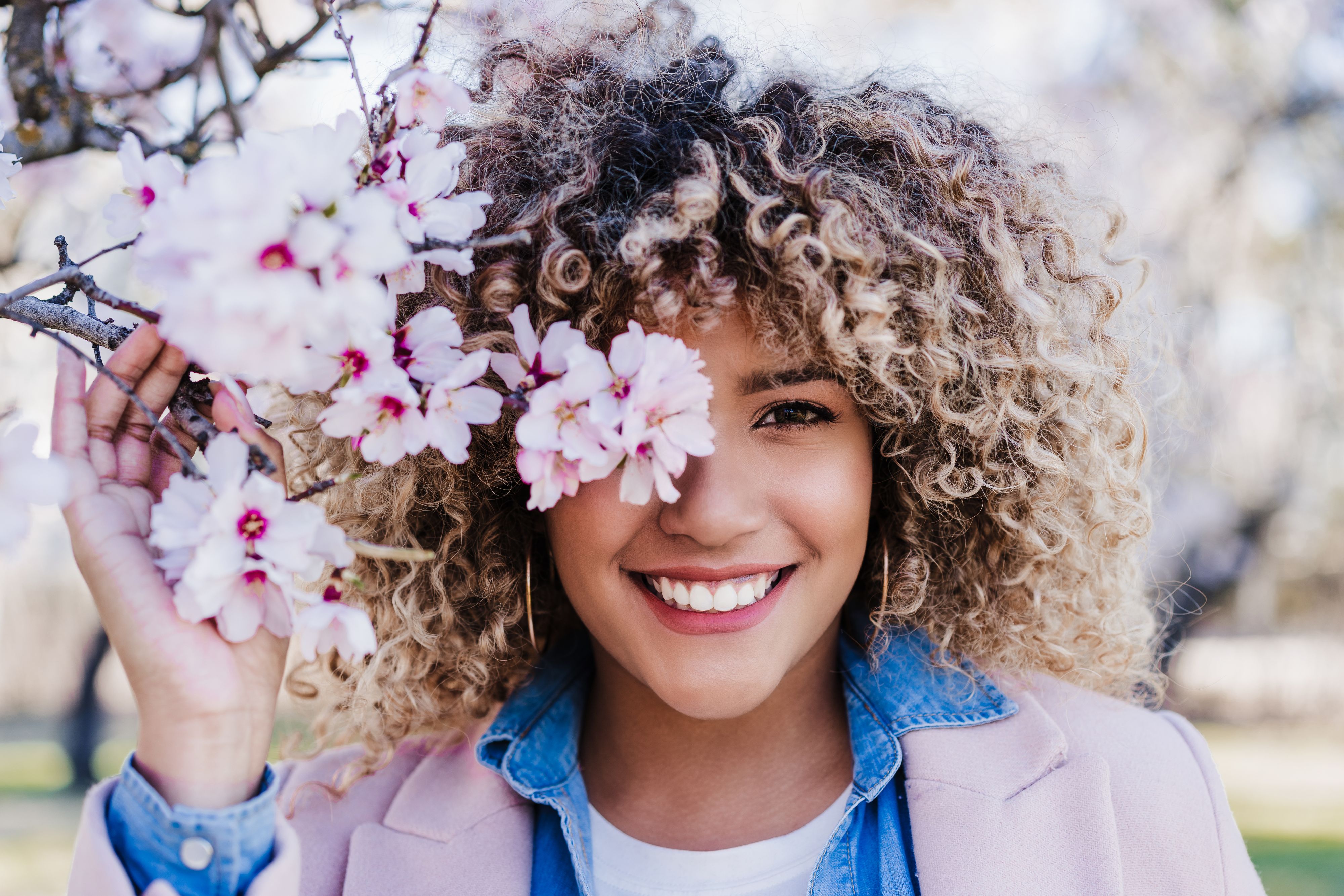 smiling-hispanic-woman-with-eyes-closed-in-park-en-2022-03-29-23-26-44-utc (1).jpg