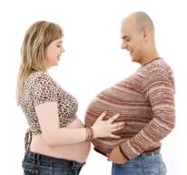 Guy and gal both Preg 2 inch.jpg