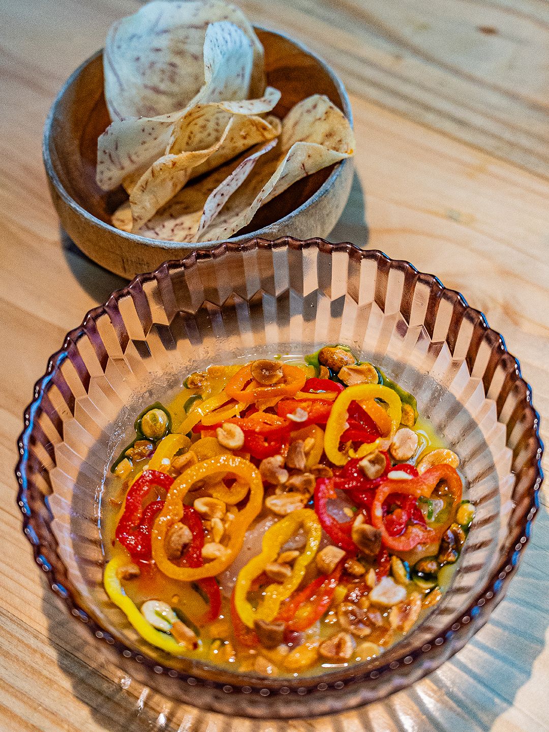 Ceviche in a bowl with side of taro chips