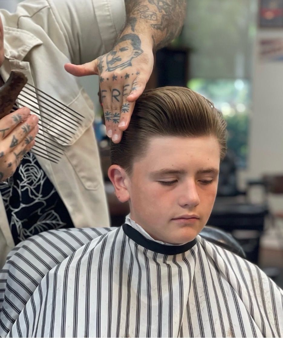 barber-performing-haircut-treasure-valley