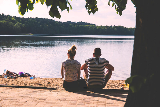 Couple on the shore enjoying the view of Canyon Lake guadalupe river vacation rentals