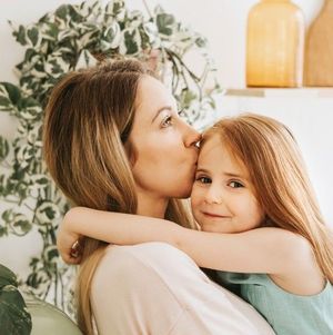 mom-young-woman-and-her-little-girl-daughter-stands-in-the-kitchen-of-a-country-house-summer-vibes_t20_mlw4p3.jpg