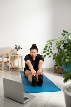 woman-following-online-fitness-instructor (1).jpg
