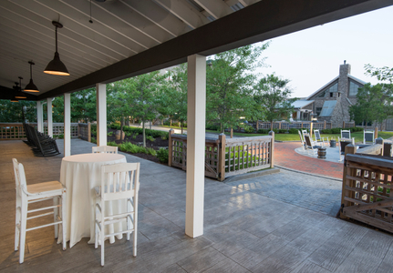 Covered porch overlooking The Inn gardens