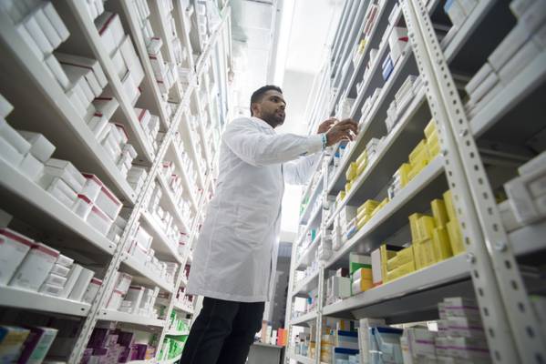 Pharmacist working with medications Clinic Drug Store