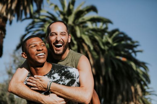 gay-couple-hugging-in-the-park-2021-04-02-19-57-31-utc.jpg