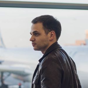 young-man-is-standing-near-window-at-the-airport-a-R3F8ZEW-min.jpg