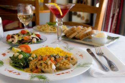 Photograph of dinner set up for Brigit and Bernards Garden Cafe advertising campaign in Kahului Maui. By Maui professional photographer Joe D'Alessandro Food photography from Maui Commercial Photographer Joe D'Alessandro. Brigit and Bernards Garden Cafe.