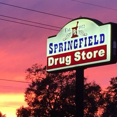 Springfield Drug Store Signage At Dusk