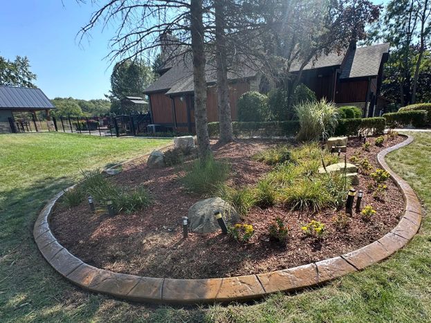 Decorative Stamped Concrete Landscape Curbing – Curved Garden Bed Edging
