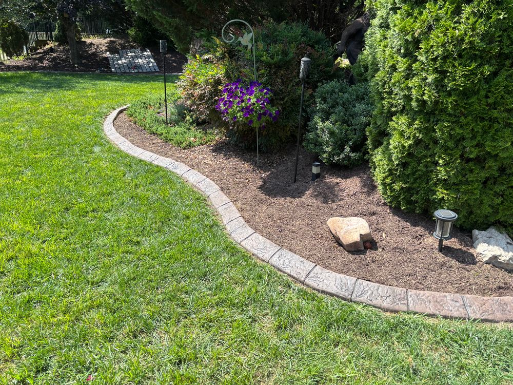 Curved concrete landscape border installed in Harrisonburg Virginia