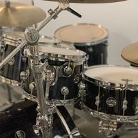 Close up of DW Drum Set