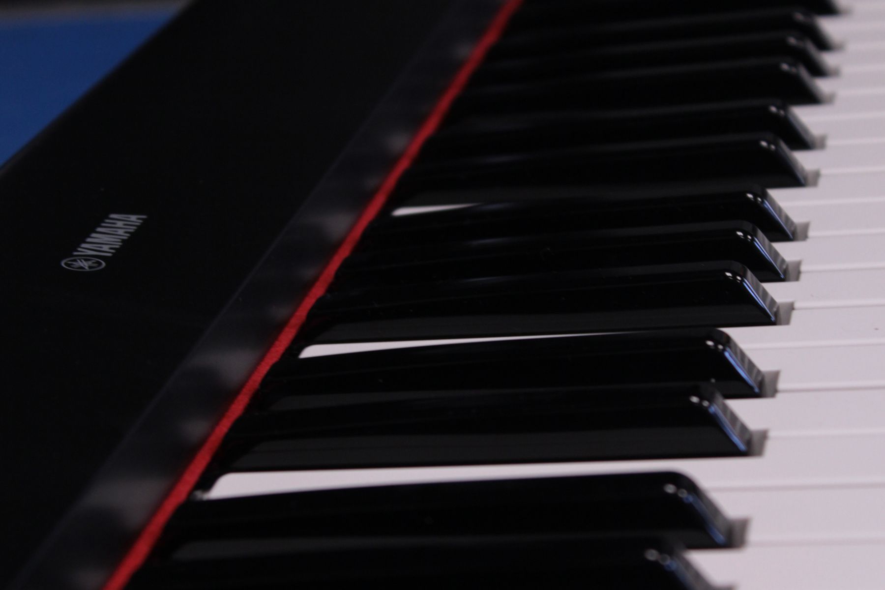 Close up of keys on a Yamaha keyboard