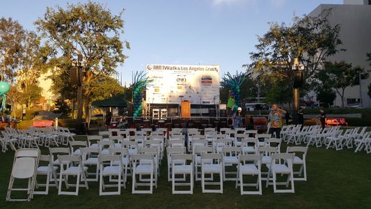 Our door event at Grand Park with stage, signage, podium, balloons