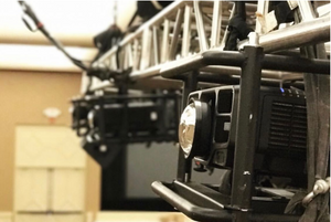 Close up of projector on a truss