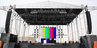 Large stage with led video wall and speakers outside
