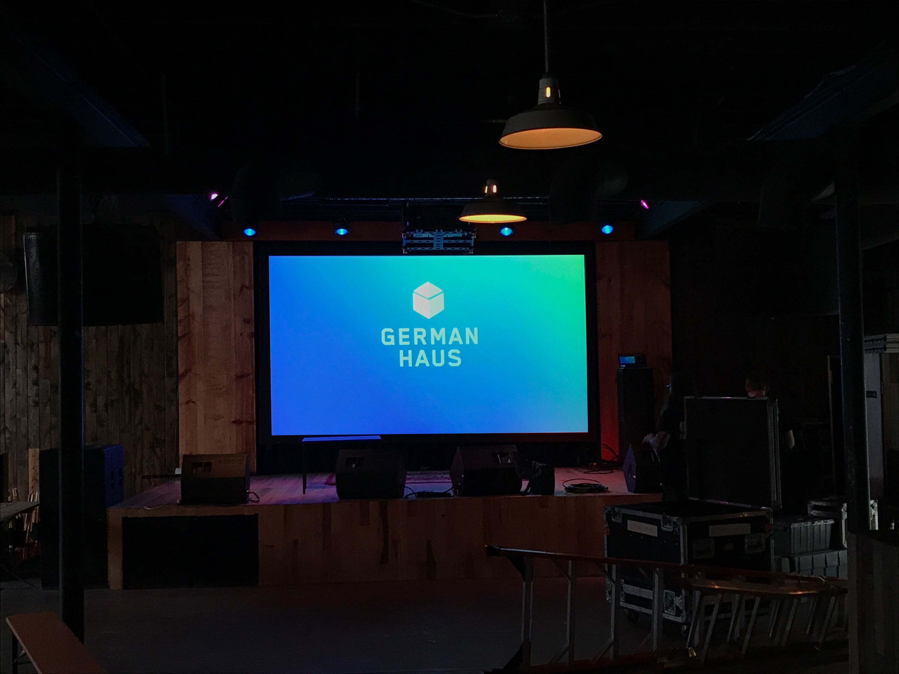 Projector Screen with German Haus Logo