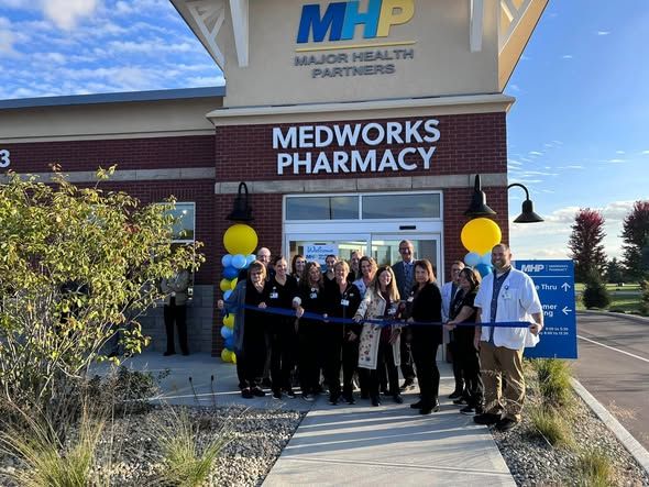 MedWorks Pharmacy team ribbon cutting.jpg