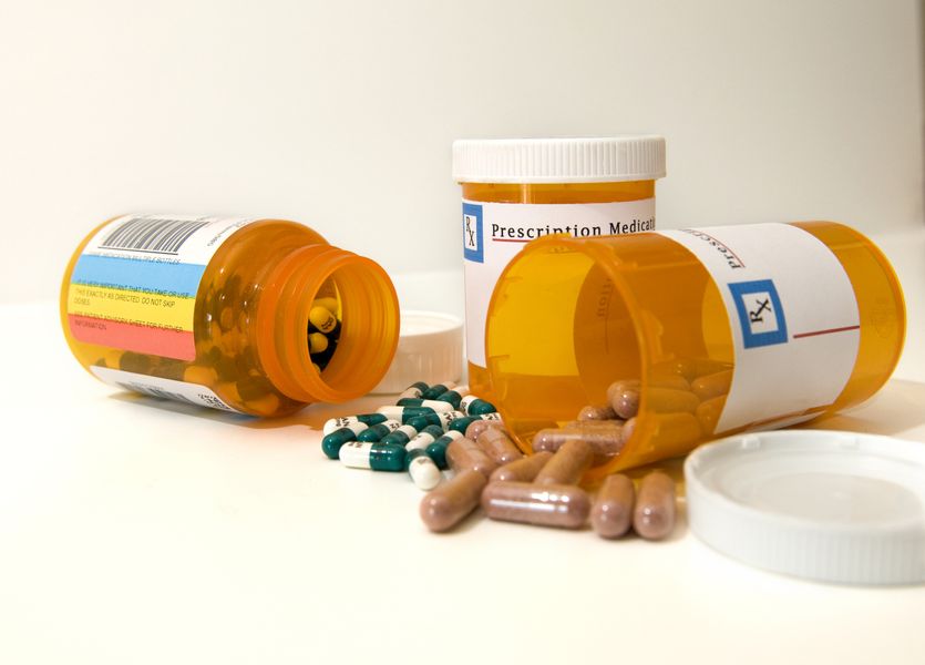 Medicine spilling out of containers Irwin Drug