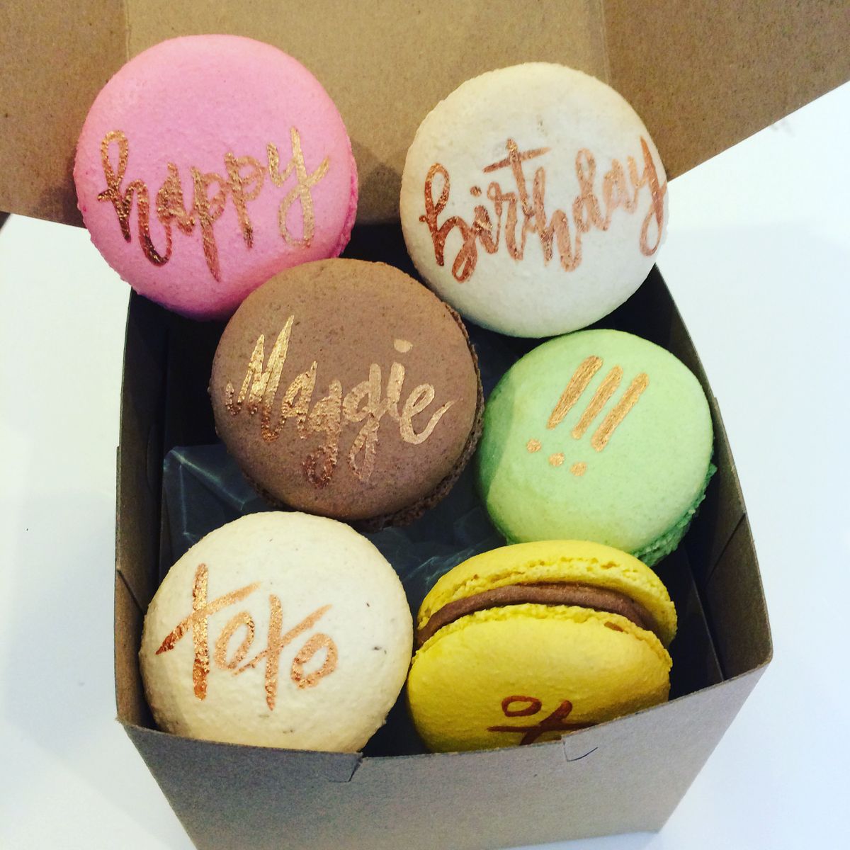 Hand painted calligraphy macarons