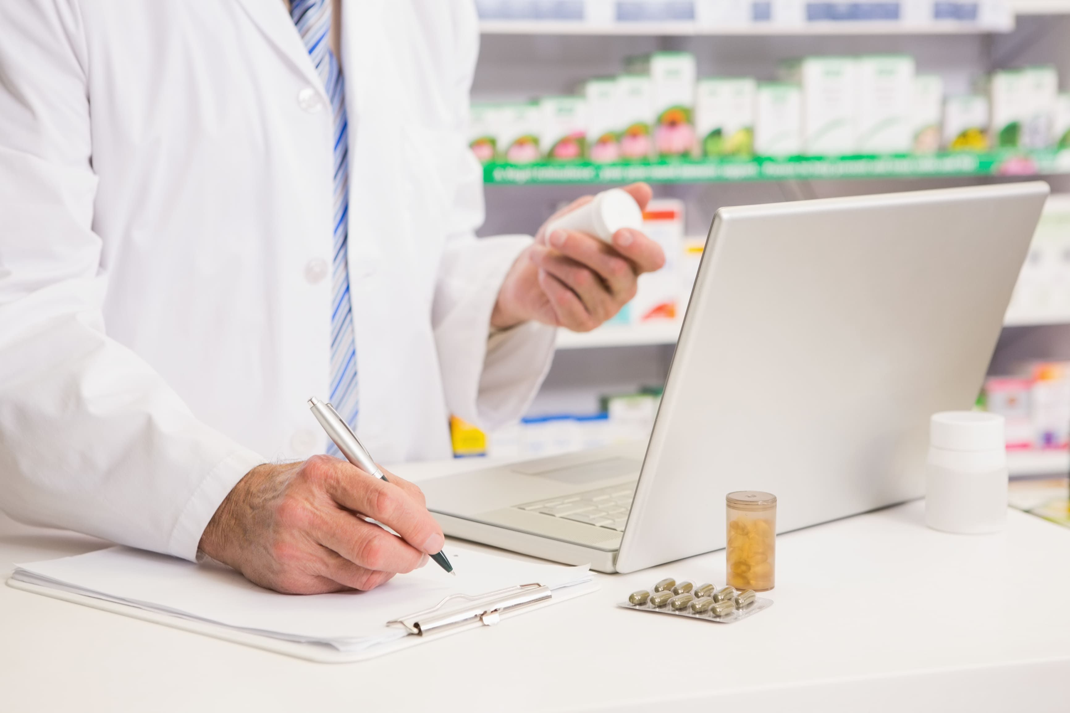 Pharmacist Checking Prescription