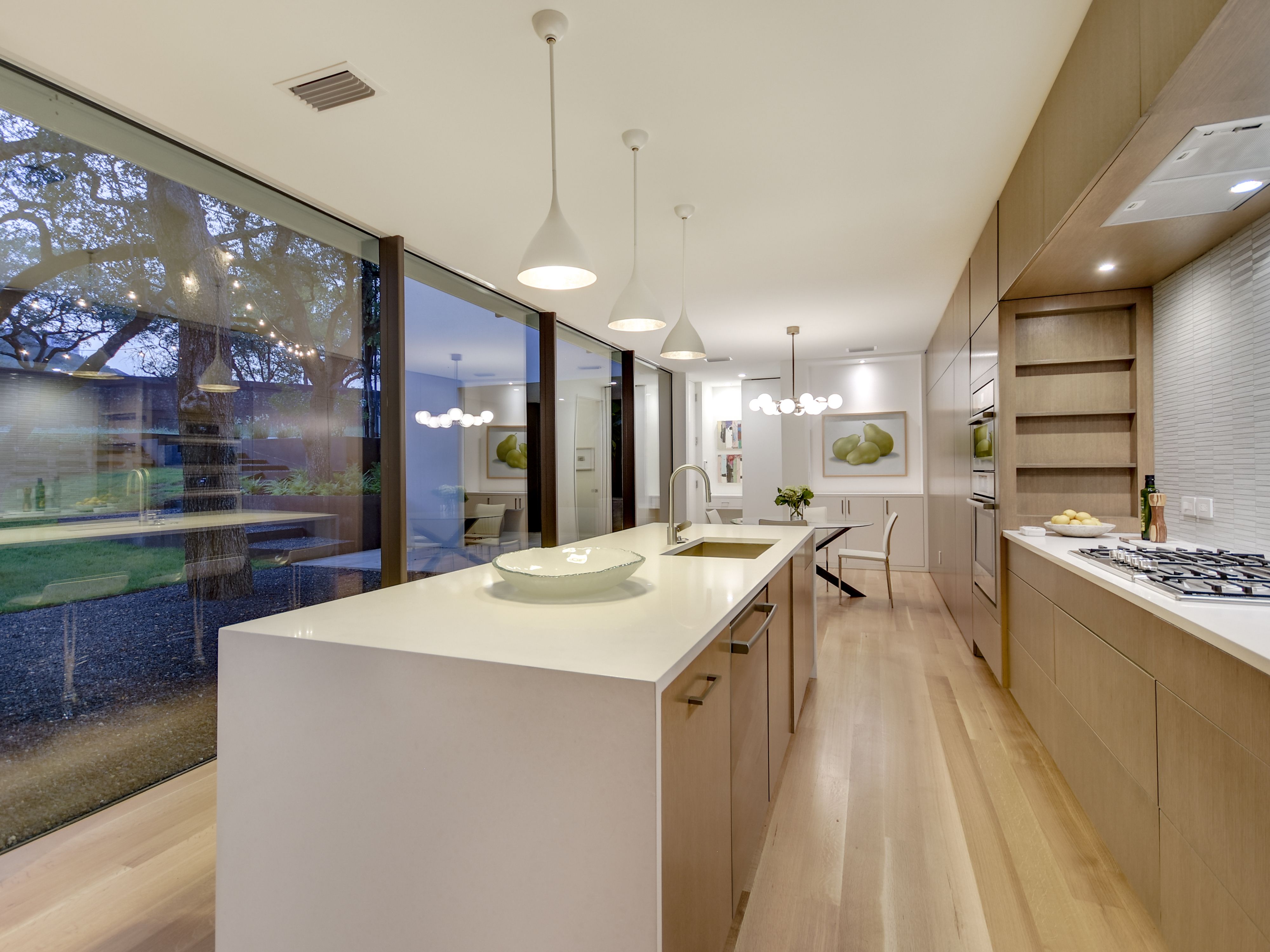 019_2201 Harbor-Twilight Kitchen-Din.jpg