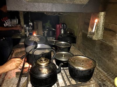 cooking on open fire kitchen stove in rainforest