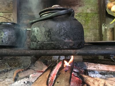 teapot on outdoor kitchen stove in Costa Rican rainforest