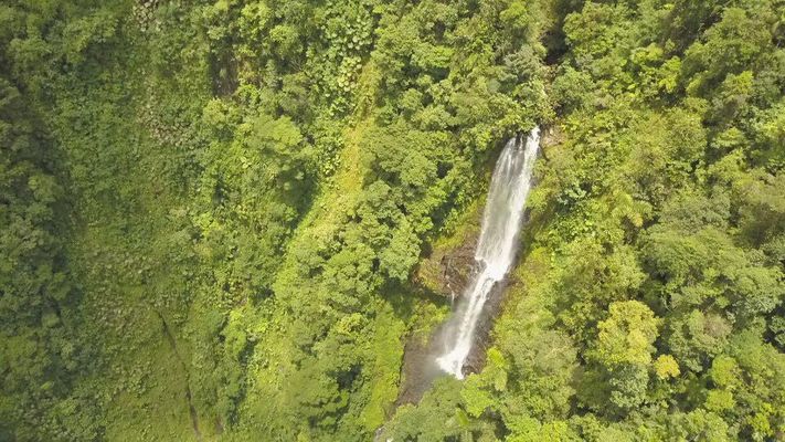 giant costa rican rainforest waterfall