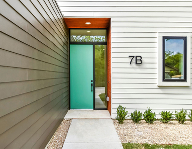 Bungalow front entry green door