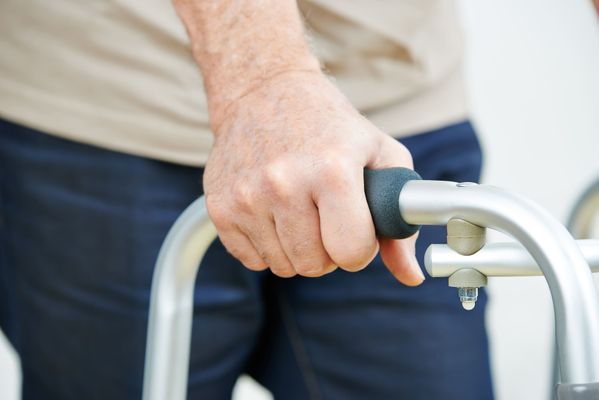 Person using a walker Durable Medical Equipment