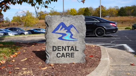 Custom engraved and etched stone commercial monument sign for Dental Care office in Harrisonburg VA, created by Angelopulos StoneCraft