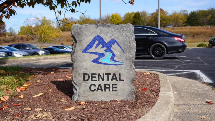 Custom engraved and etched stone commercial monument sign for Dental Care office in Harrisonburg VA, created by Angelopulos StoneCraft