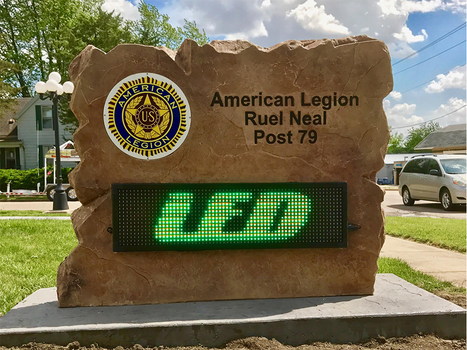 Custom carved stone entrance sign with LED message board for American Legion Ruel Neal Post 79