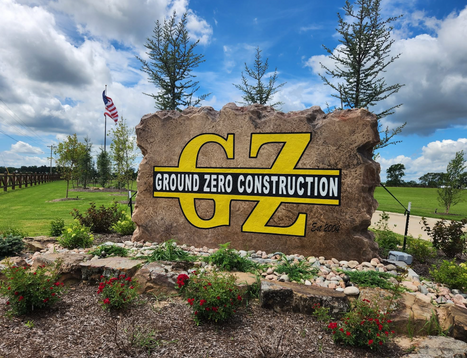 Custom crafted engraved construction company boulder sign