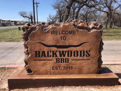 Custom crafted engraved restaurant welcome boulder sign
