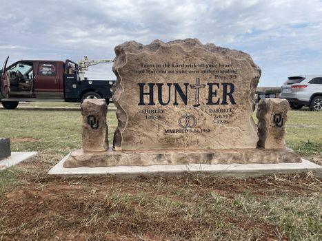 Personalized double upright memorial headstone carved from stone boulder